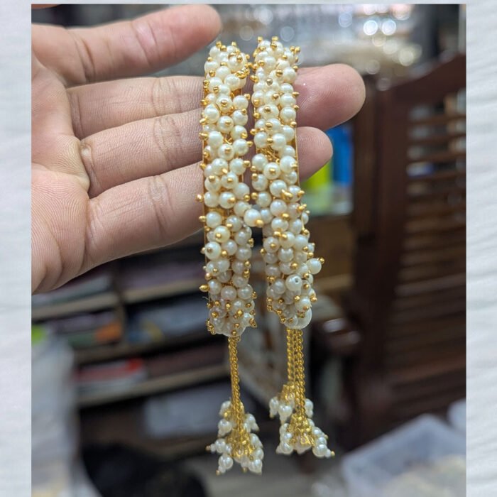 Gold-bangle-with-pearl-tassels