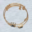 Black Stone Geometric Gold Bangles – Triple Band Design with Charms
